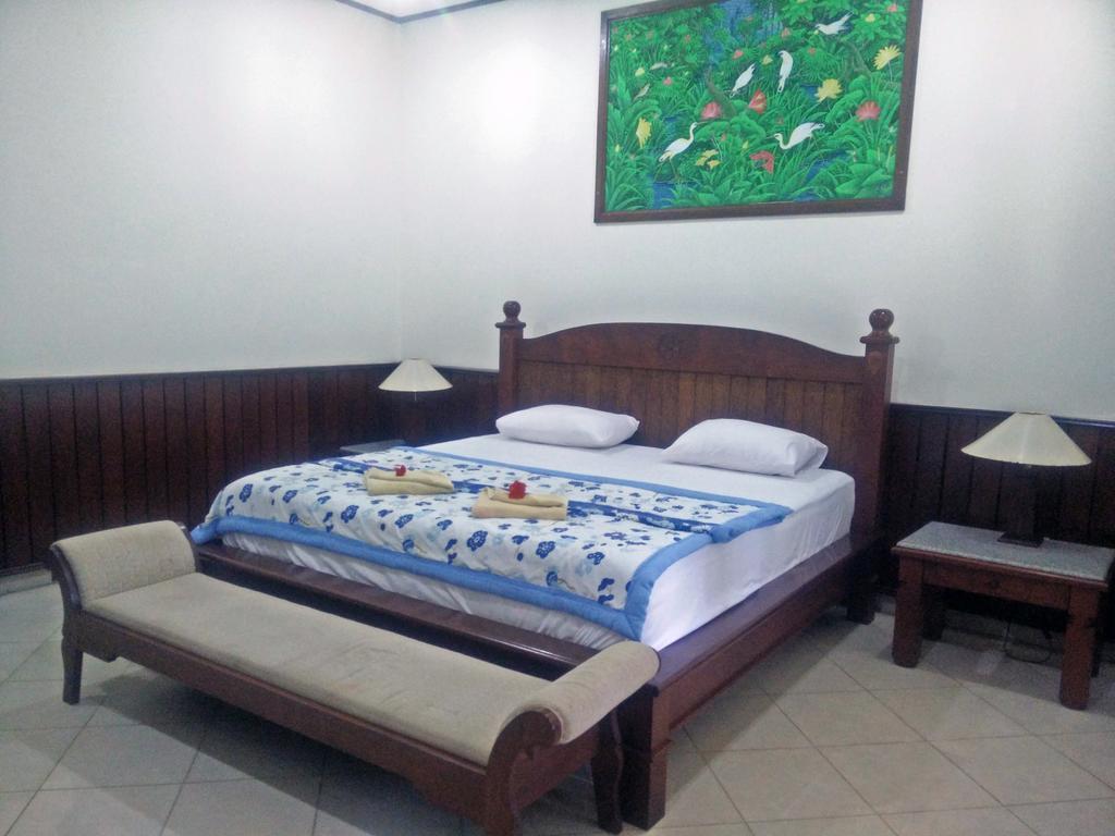 פדנגבאי Puri Rai Hotel מראה חיצוני תמונה